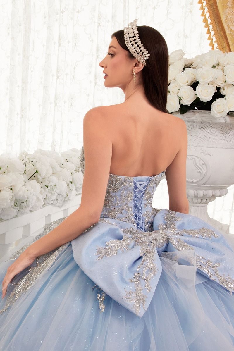 STRAPLESS LAYERED BALL GOWN WITH BOW DETAIL