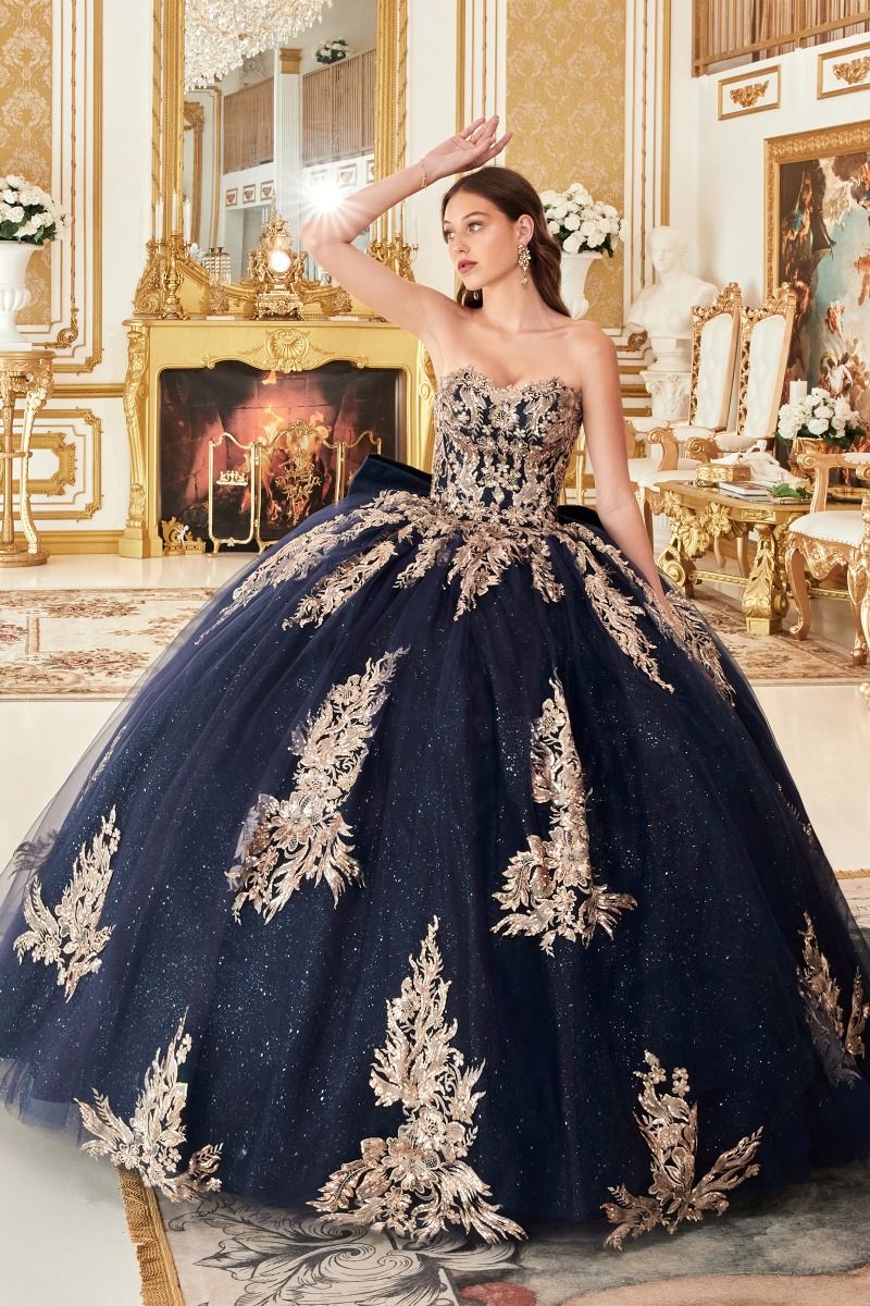 STRAPLESS LAYERED BALL GOWN WITH BOW DETAIL